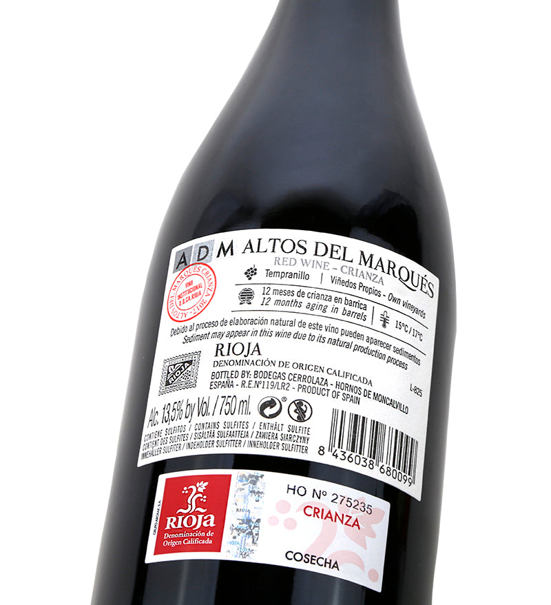 Contraetiqueta del vino ADM Crianza 2022 Rioja Alta mostrando detalles de 12 meses en barrica y 13,5% de alcohol.